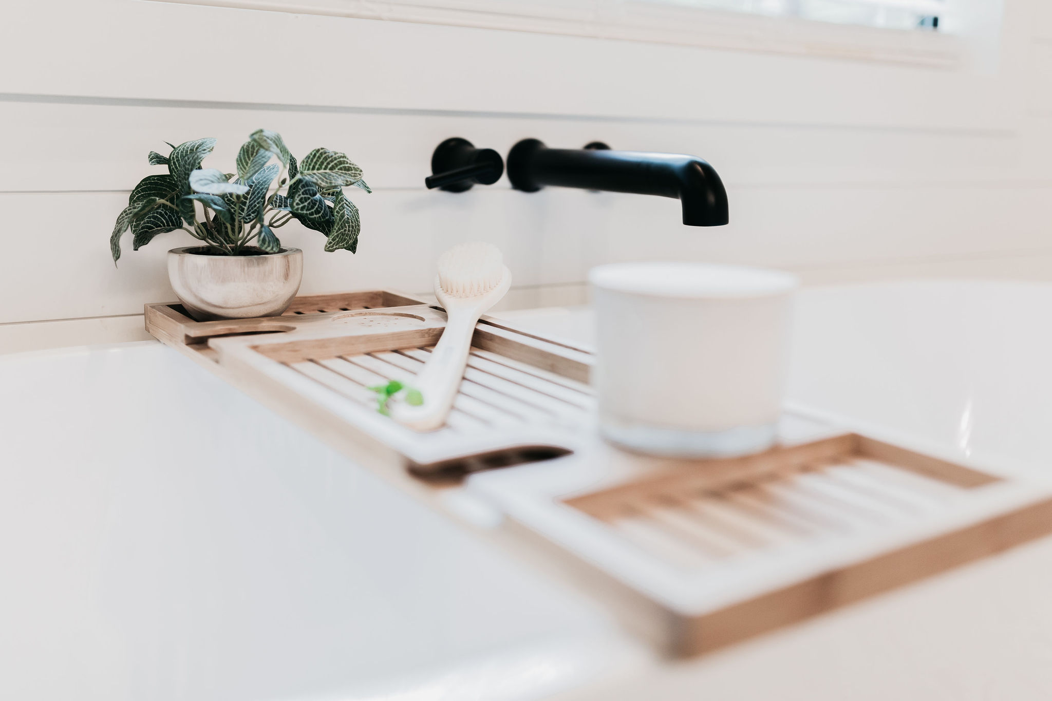 Spa-Like Retreat: Unwind with lush greenery and elegant bath accessories just for you!