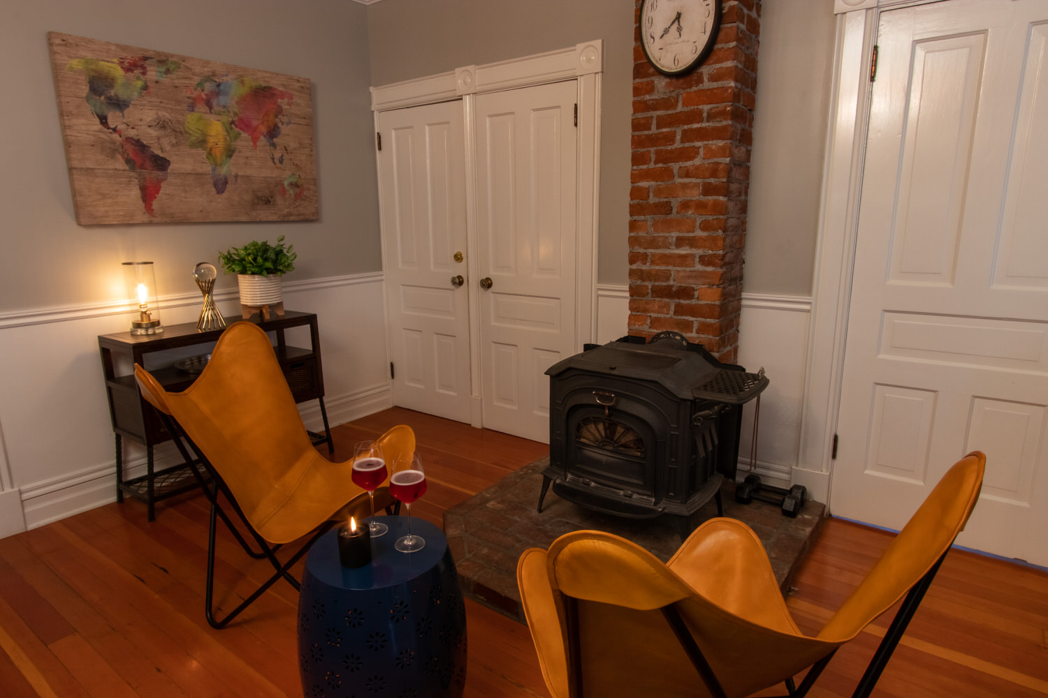Lounge seating with wood stove (firewood provided), adjacent to the kitchen and breakfast nook