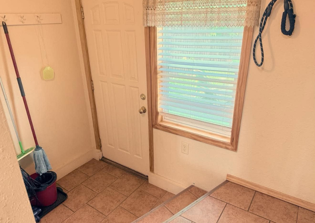 Back entry way for access to the fenced in back yard.  