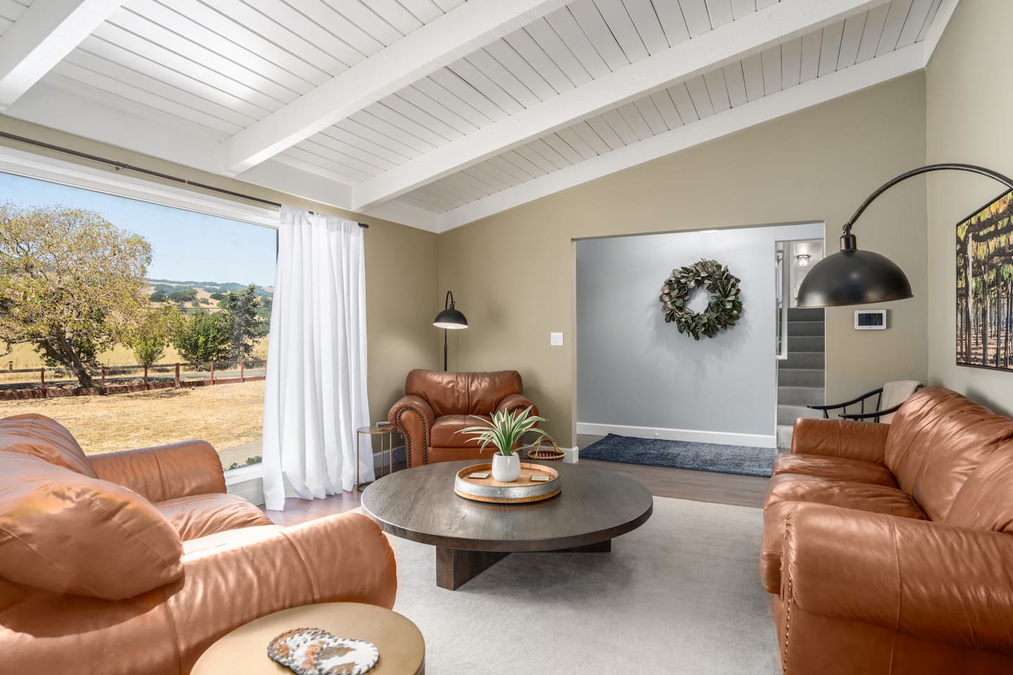 Cozy up and let  the soothing tunes from our SONOS speakers envelop you.