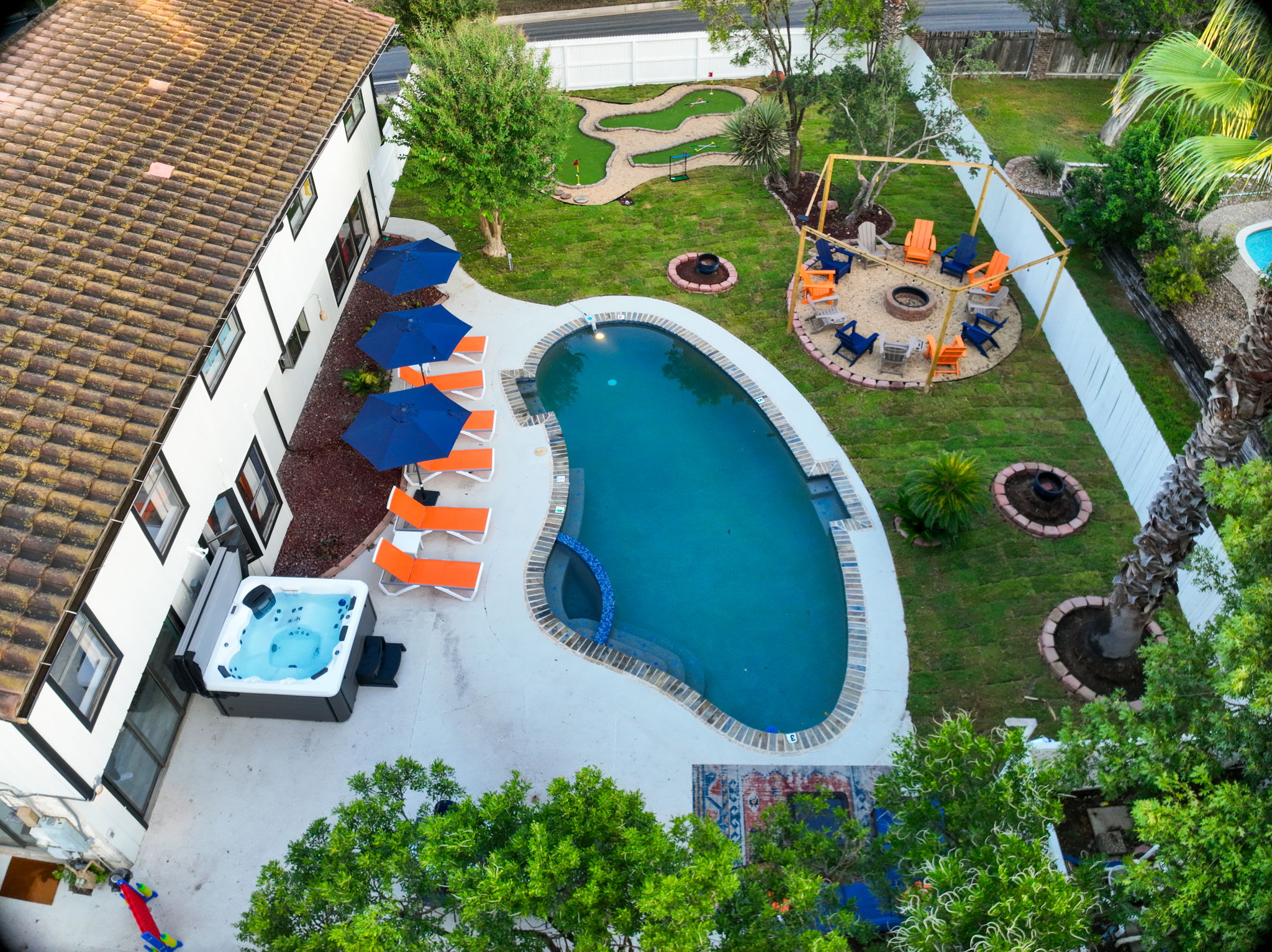 Resort-style patio with plenty of seating for lounging, chatting, and poolside fun. A perfect blend of luxury and leisure! Your ultimate San Antonio retreat awaits at the Comfy Coyote.