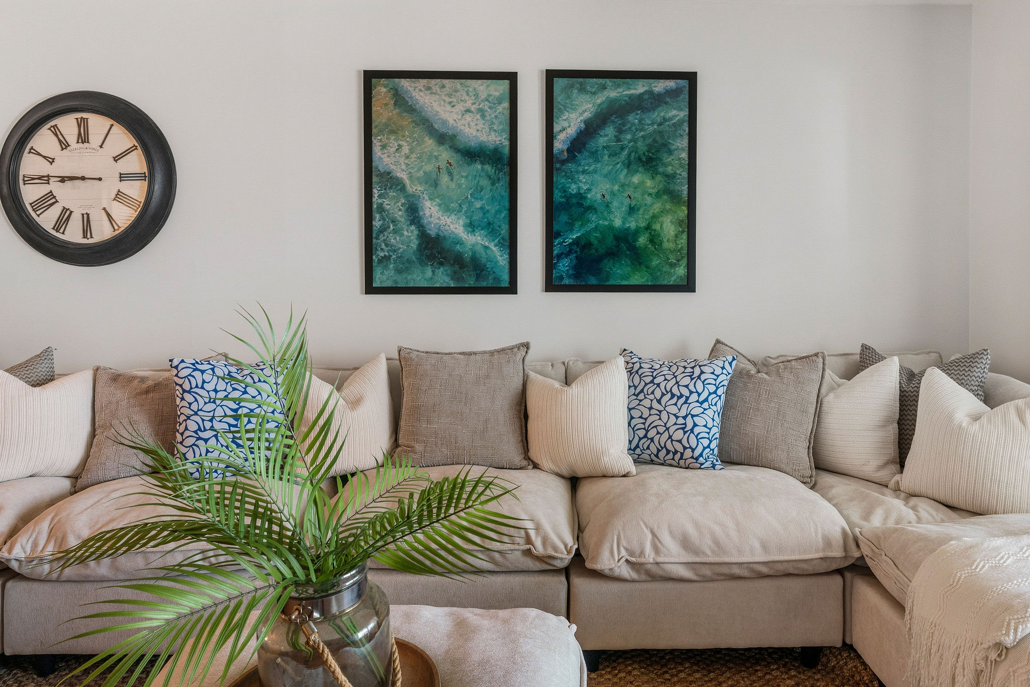 Custom accents like super cozy pillows, throw blankets and pretty greens make this a spot you will never want to leave.