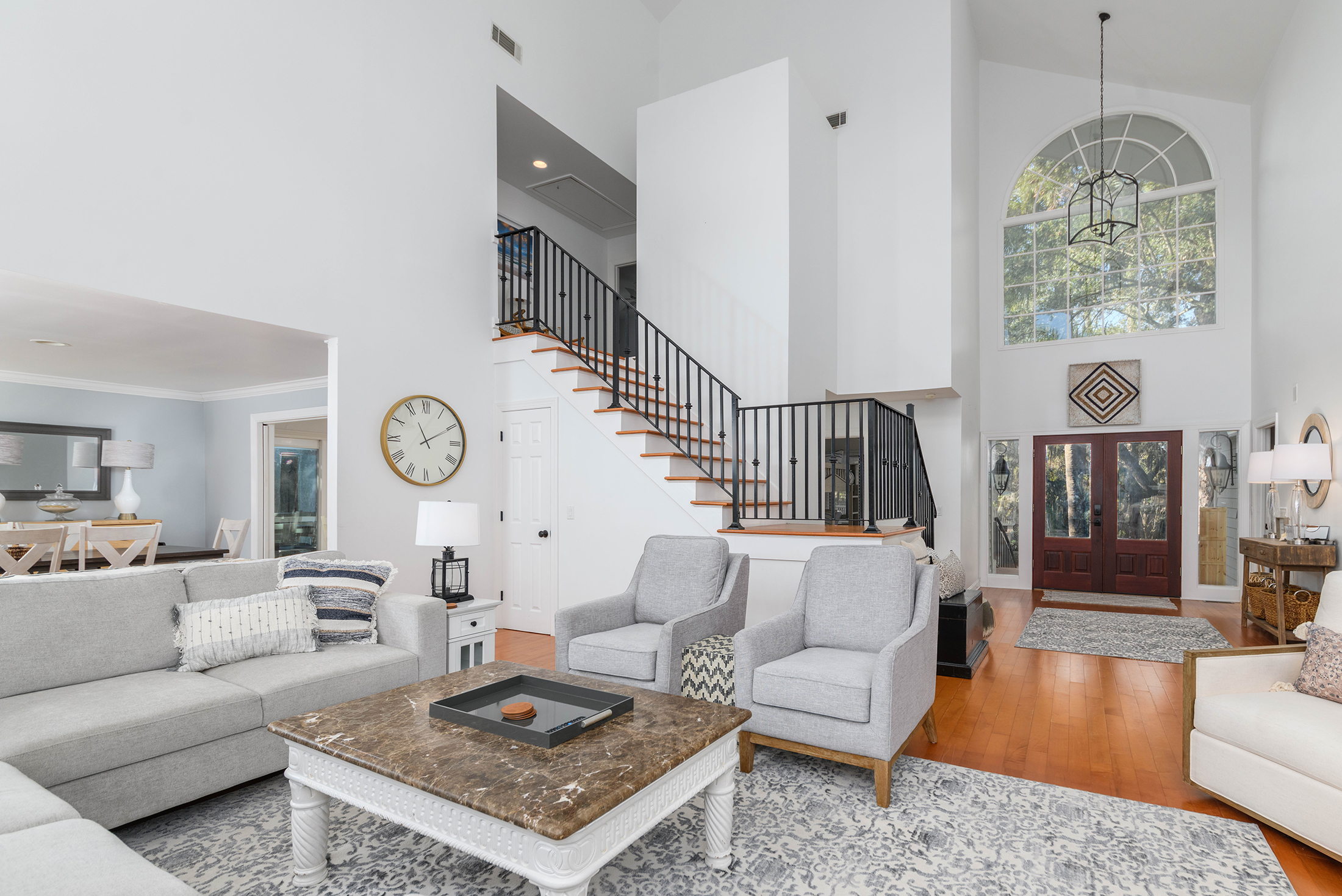 View from LR to foyer and staircase to the second floor