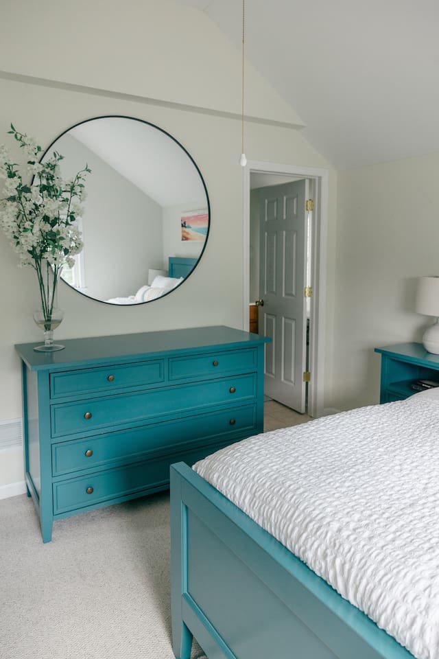 Large dresser available for guests next to the primary bathroom. 