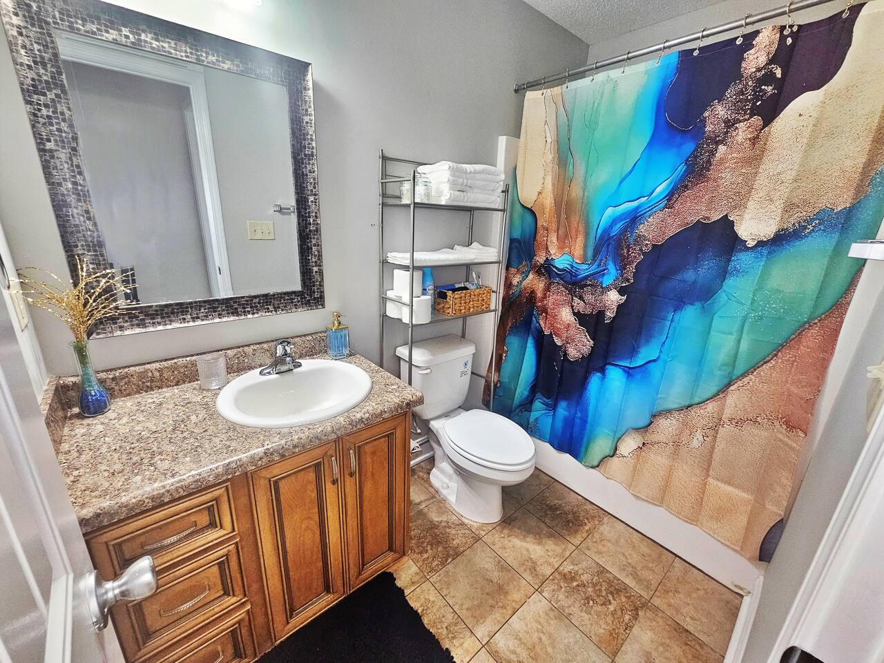 Full-sized bathroom located in the hall.  It contains all your necessities and a little extra. 
