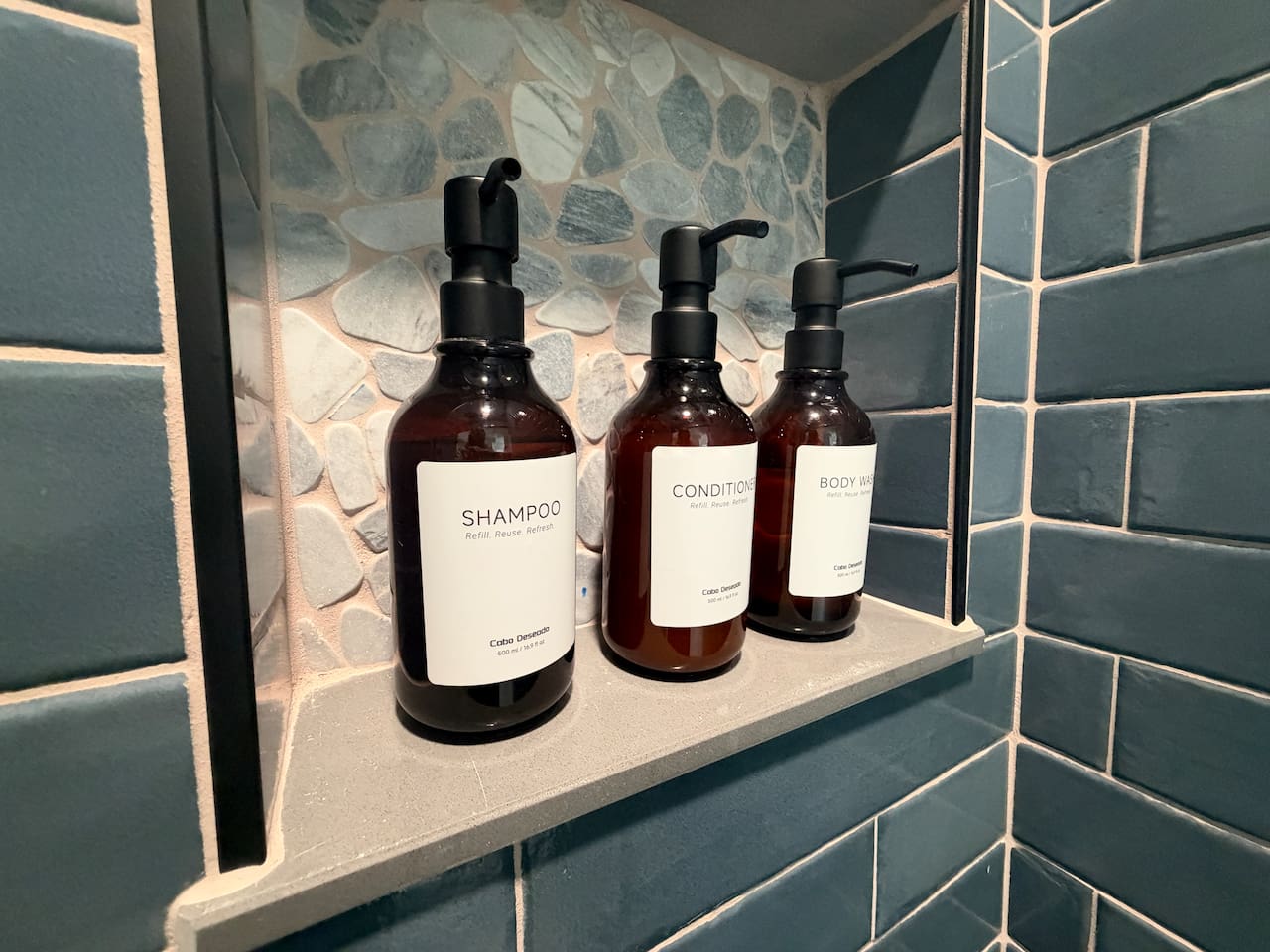 Provided shampoo, conditioner, and body wash in each bathroom.