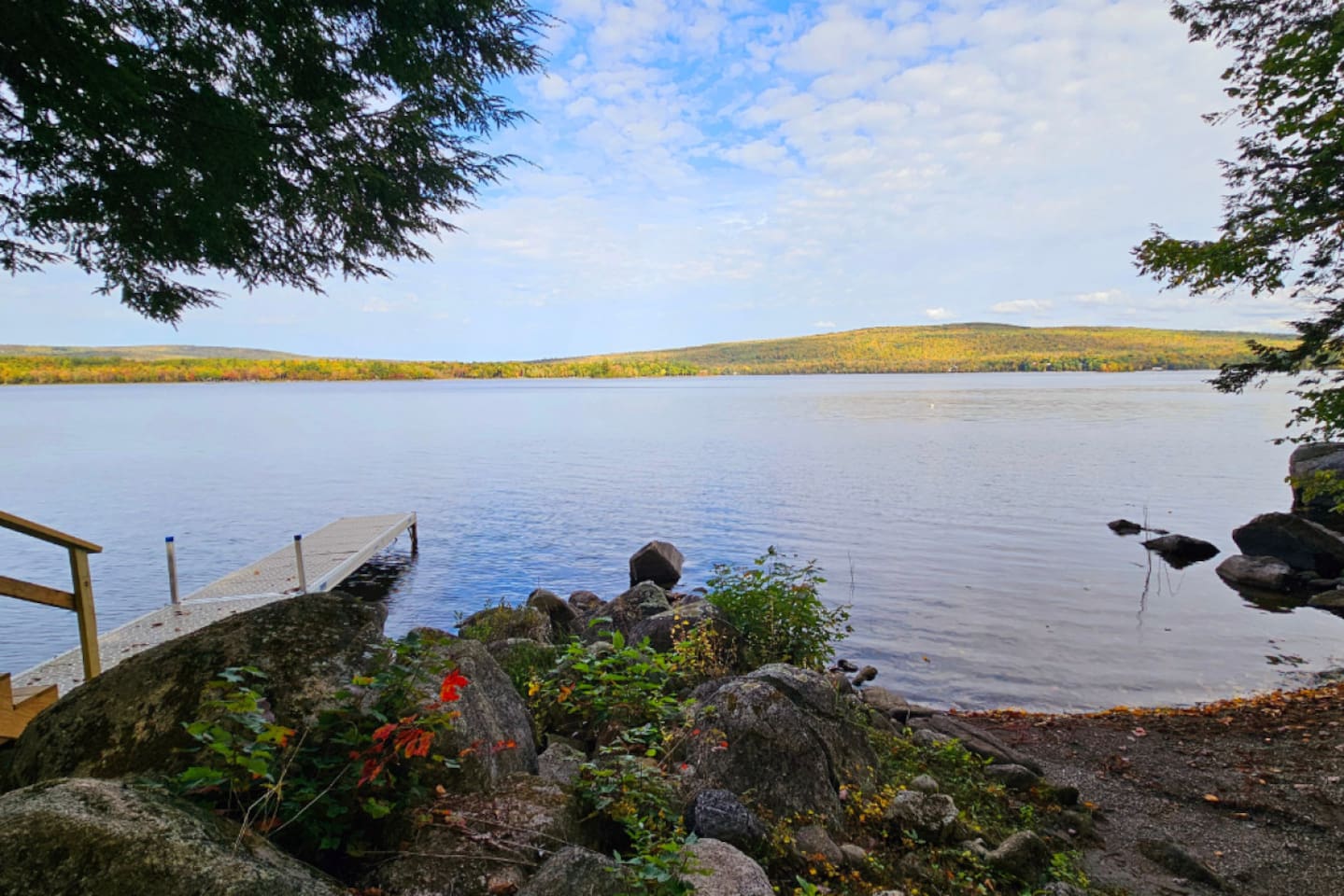 Private pebble beach and dock