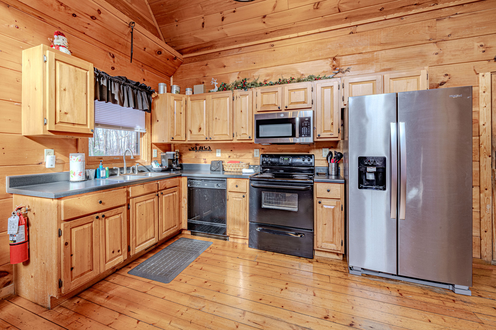 Let the warmth of Christmas welcome you to Honey Bee Holler