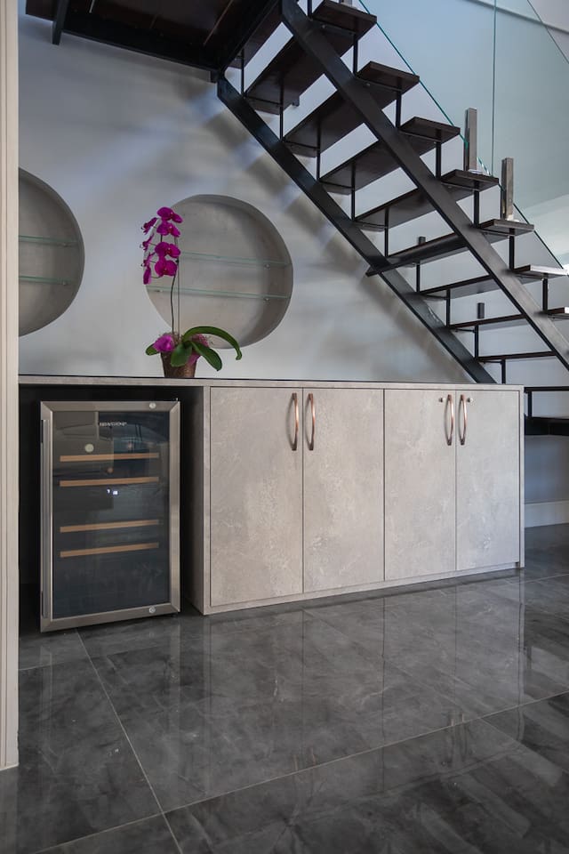 Wine refrigerator and crystal wine and champagne glasses!