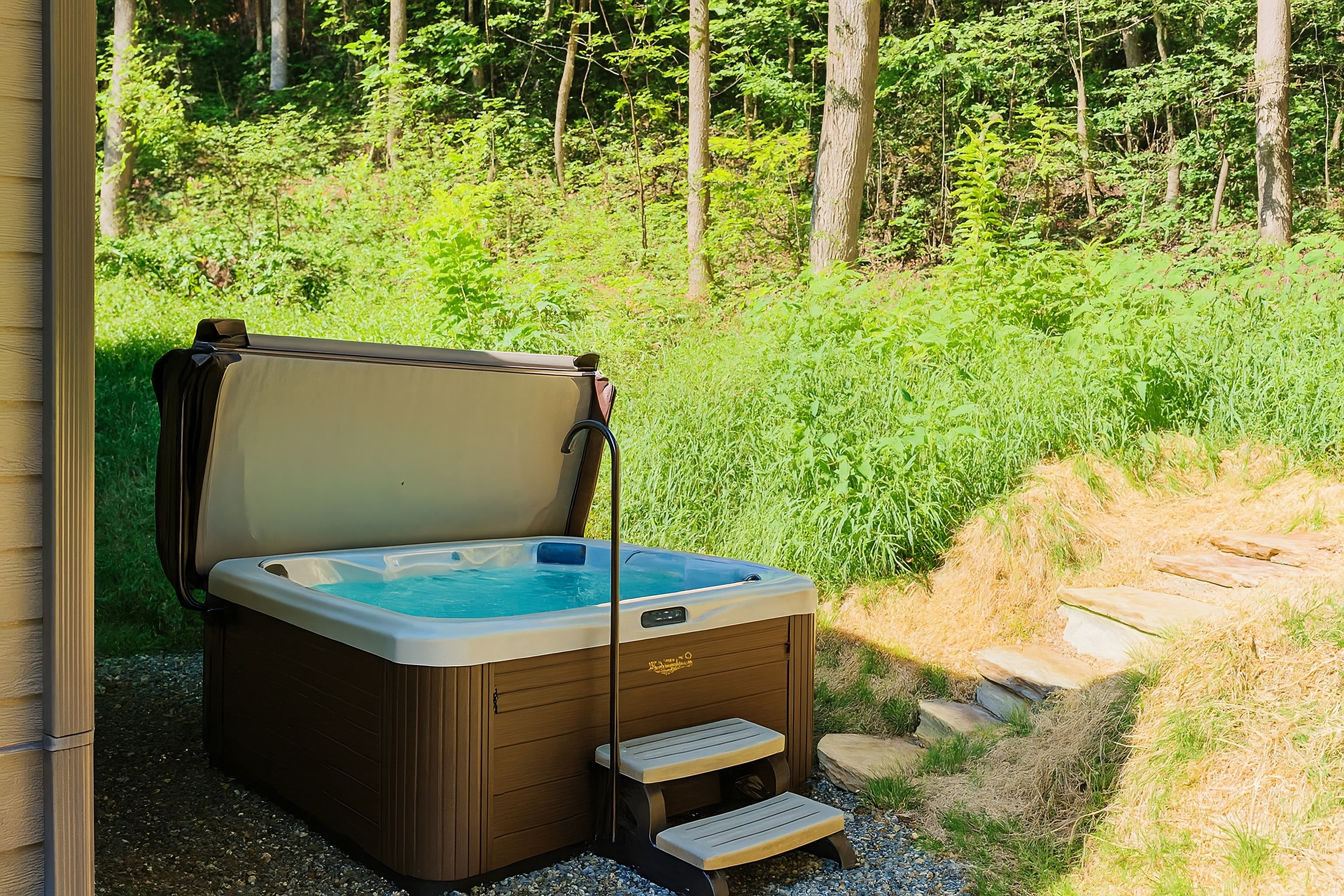 Two person hot tub around back!