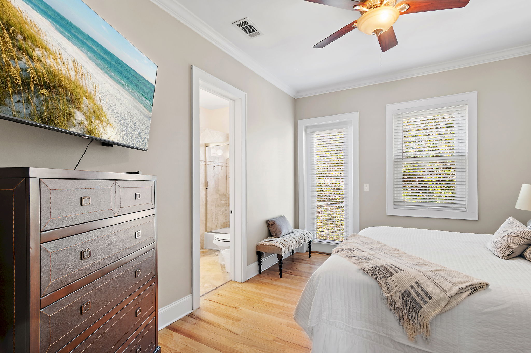 Primary bedroom with attached large bathroom is on the 3rd floor, across the landing from the bunk room.