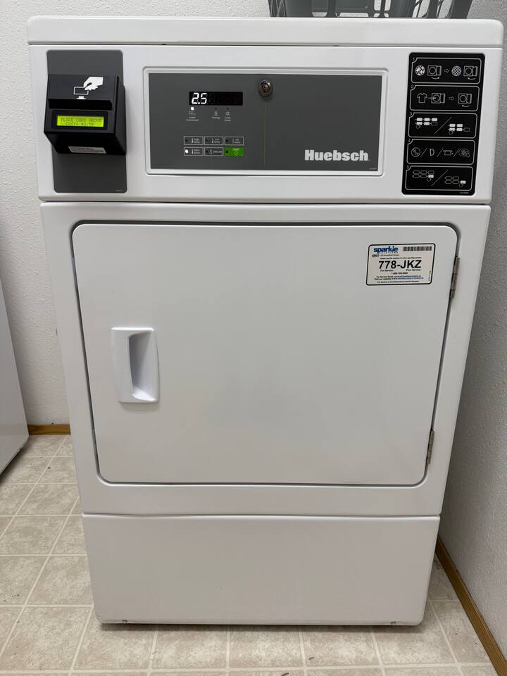 I find these dryers hold a lot. It takes 60 minutes to complete a cycle. Located in the lower level of the clubhouse. Take the Sparkle Card hanging in the townhouse entrance. See the house manual for more information.