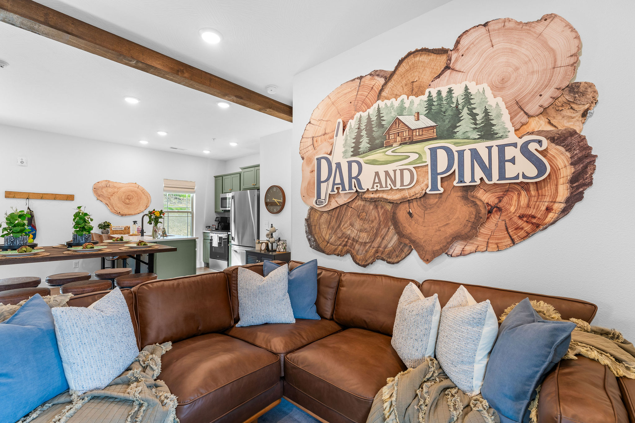 The living room, kitchen and dining area are all connected for great family gathering time, playing games, telling stories or just chilling.