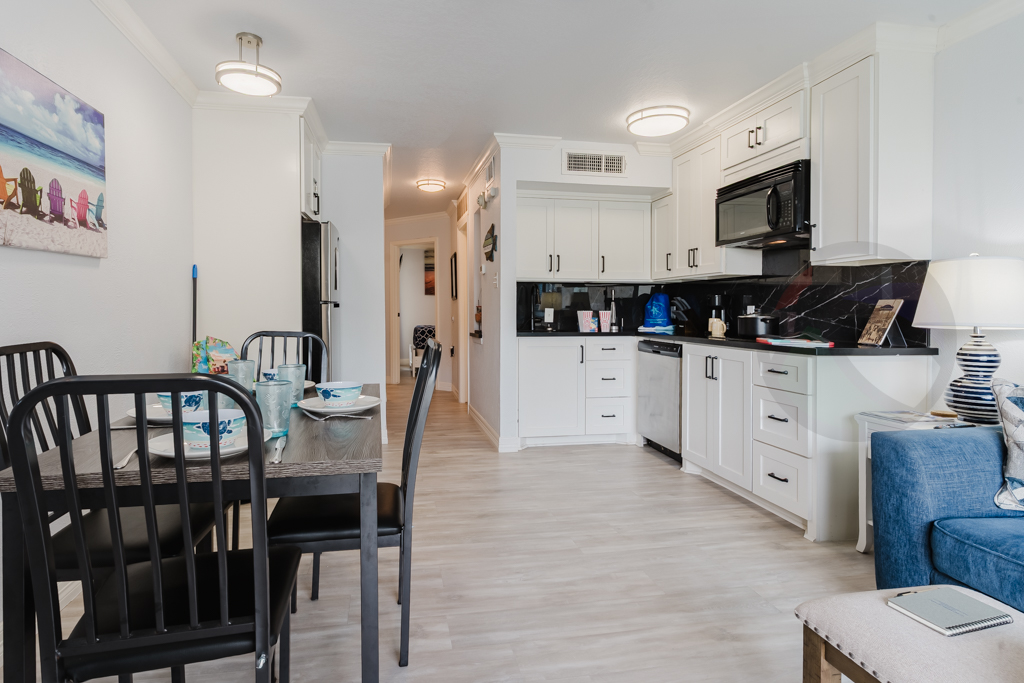 Large fridge, microwave, dishwasher, 2 burner cooktop