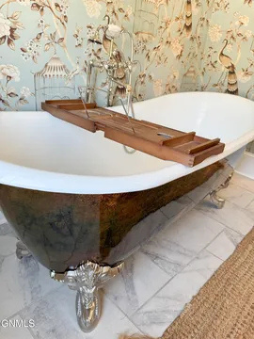 Perfect for unwinding at the end of the day, this tub brings a cozy spa-like vibe.