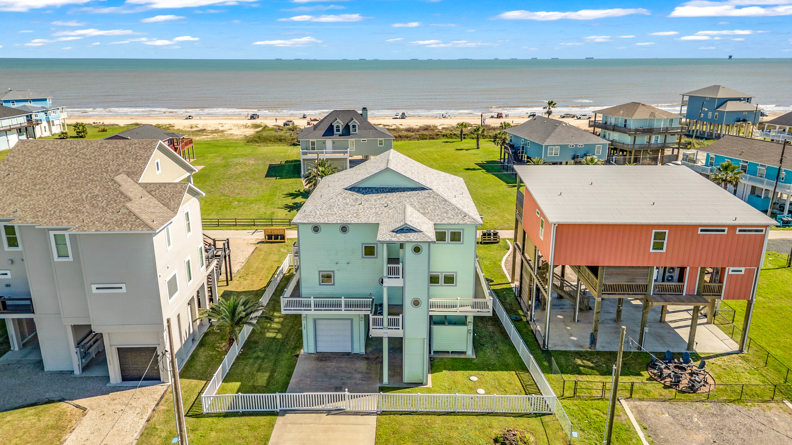 Crystal Paradise Exterior: Welcome to your coastal escape, this is the home and ocean scenery that will set the tone for your entire stay.