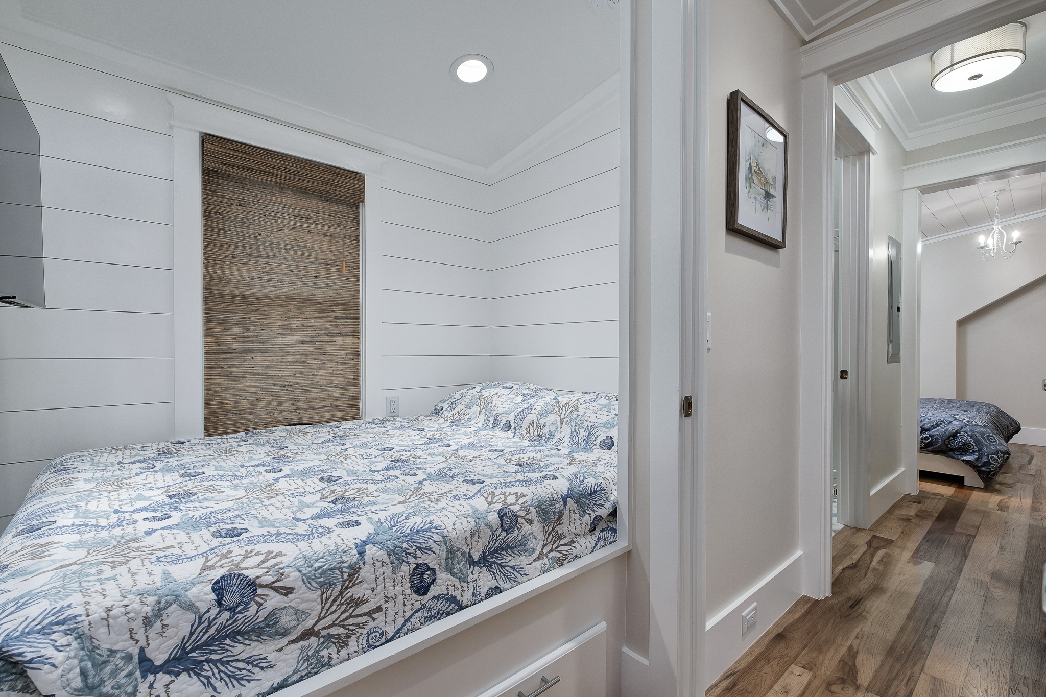 3rd bedroom boasts a built in queen bed and small closet for hanging clothes.  Wall mounted TV is great for kids!