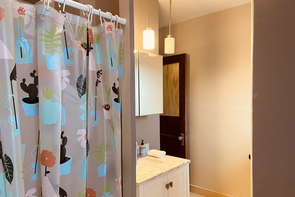 Shared bathroom. Separate Tub and shower.