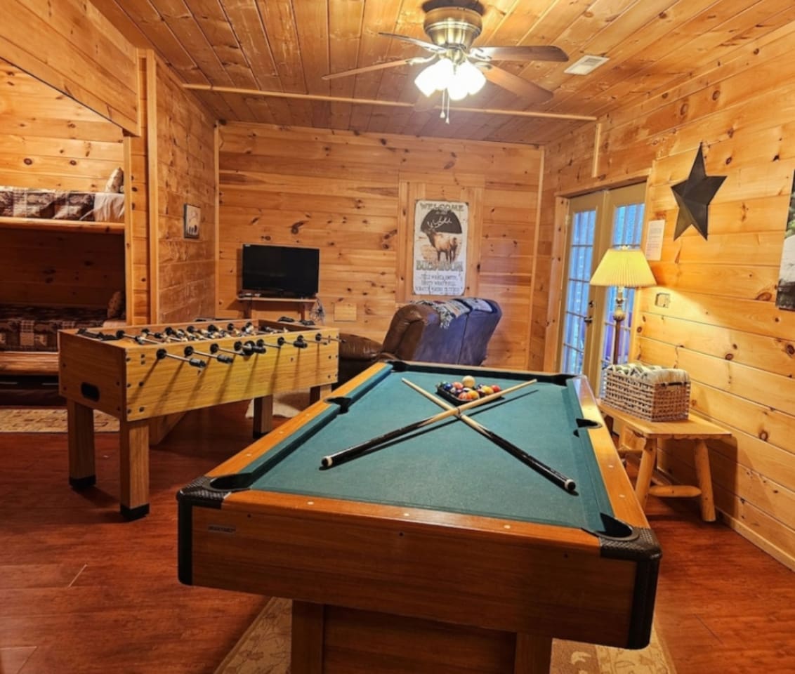 Downstairs game room with French Doors to hot tub.