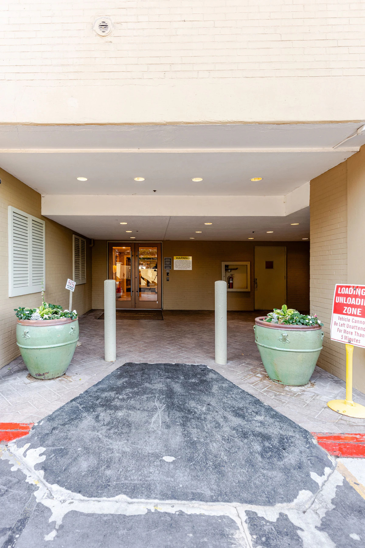 Conveniently access Peachtree Towers through the secure back entrance directly from the parking area.
