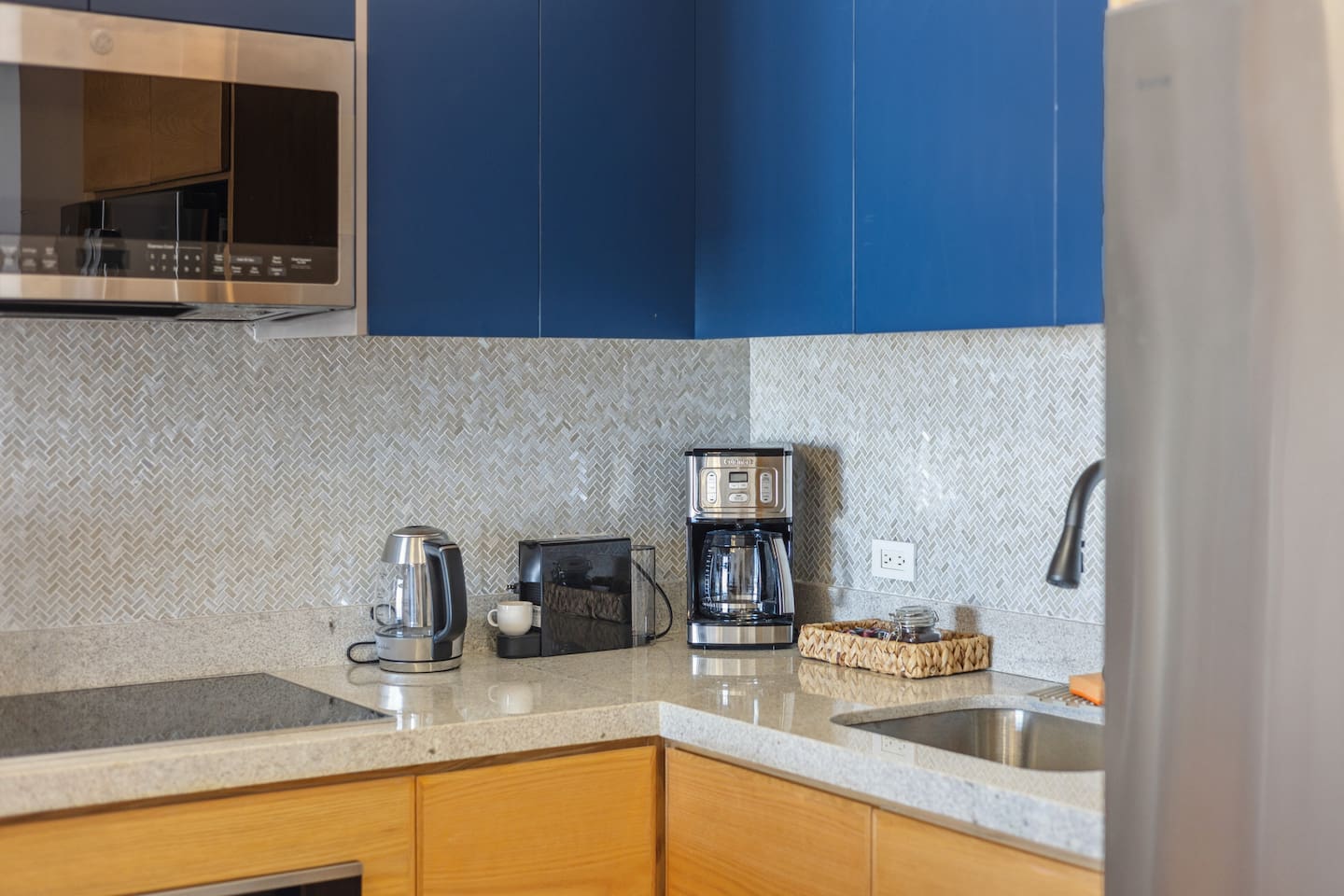Enjoy coffee, tea, and espresso all day with our premium Cuisinart coffee maker, sleek Nespresso Mini (just like George Clooney’s favorite), and Sur La Table hot water kettle.