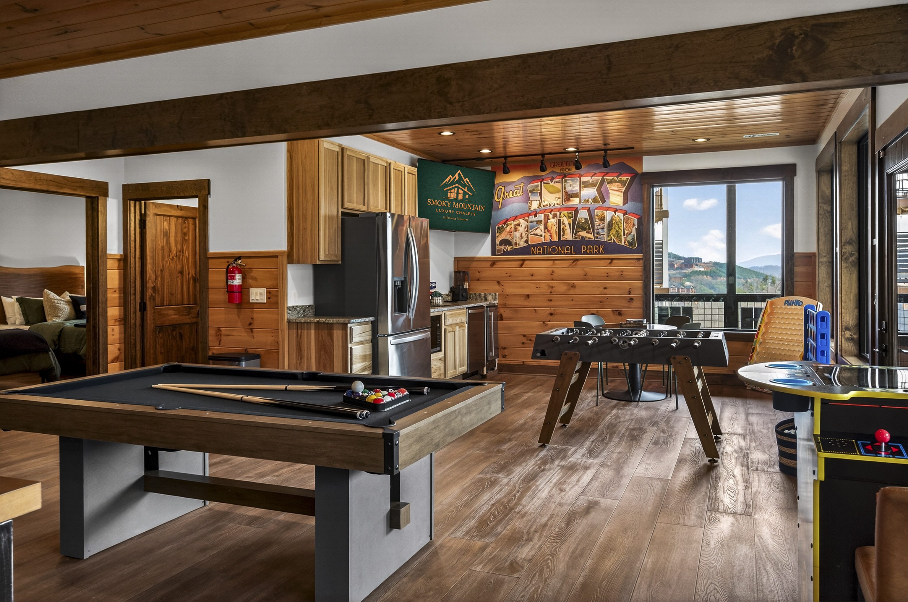 The perfect hangout after a day exploring the Smokies. Enjoy hours of fun with pool, shuffleboard, foosball & classic arcade tables plus a convenient kitchenette for snacks and drinks. This entertainment-packed space is designed for family fun, game nights