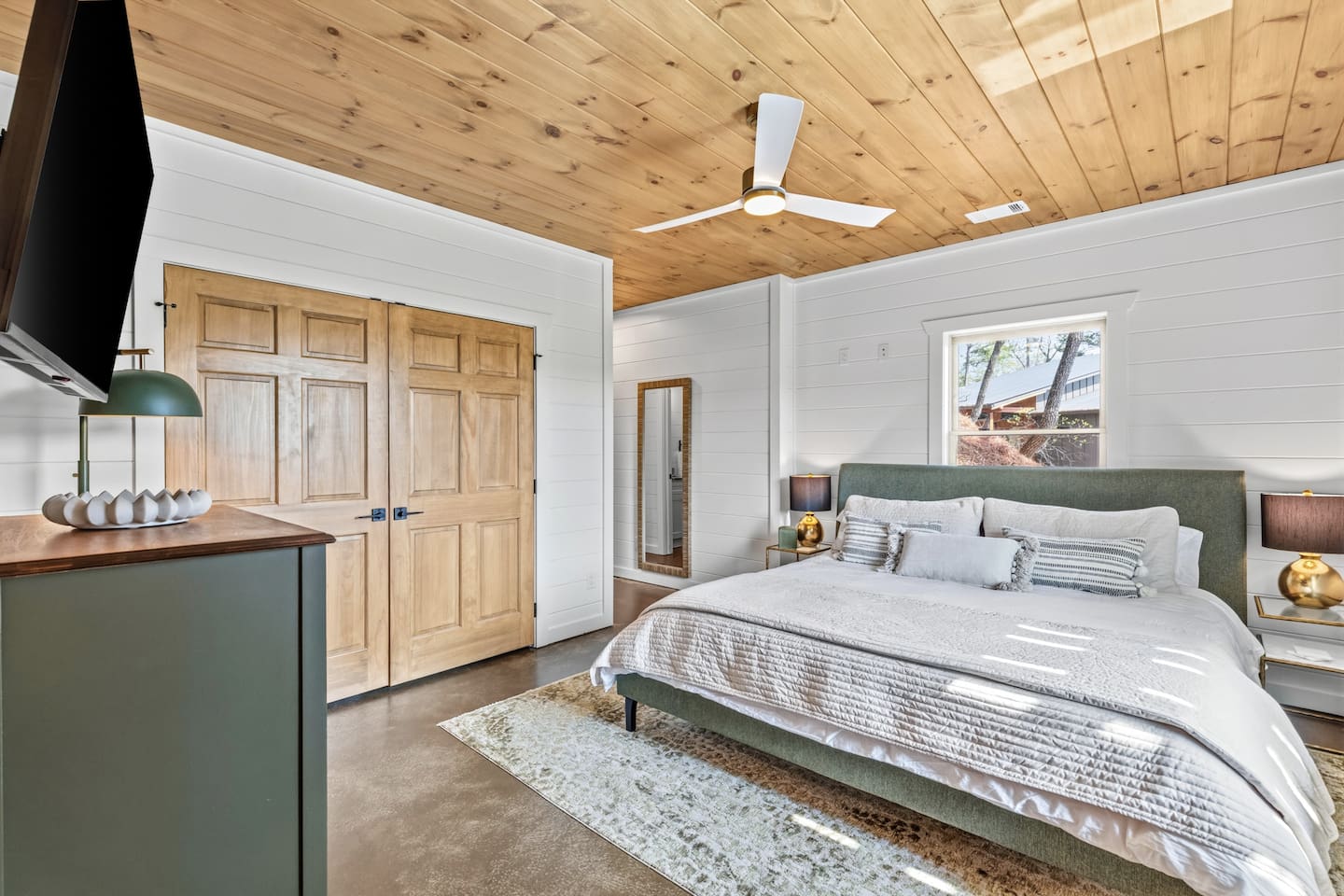 Relax in this bright, spacious bedroom featuring a comfortable king Nectar mattress. Enjoy your private en-suite bath with a luxury shower including body jets and rain shower head, plus a generous closet for all your belongings. 