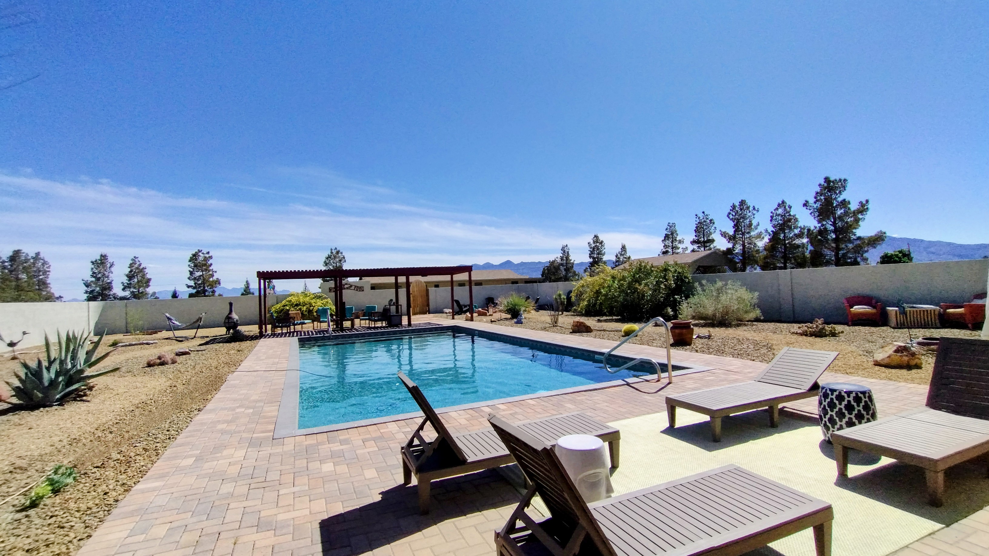Your private oasis pool and yard with games, seating and beautiful views