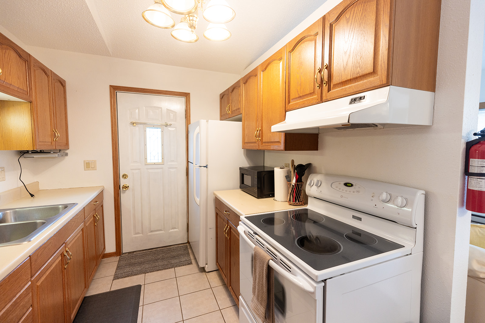 Galley kitchen with glass top range