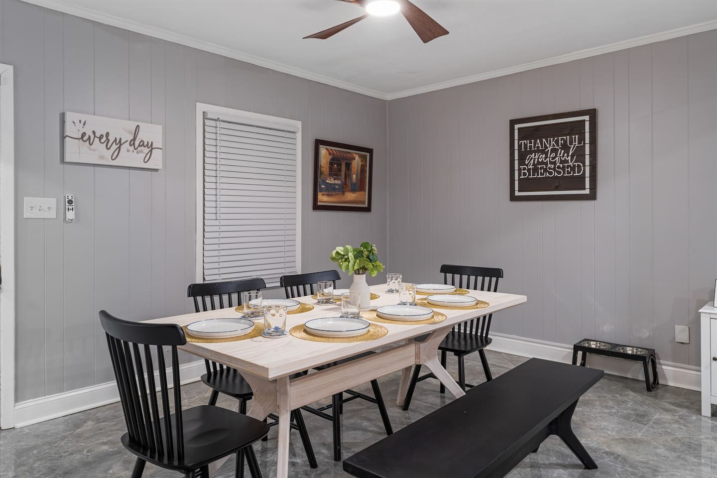 Enjoy meals, morning coffee, or late-night chats in this cozy dining room equipped with a TV for added comfort and entertainment.