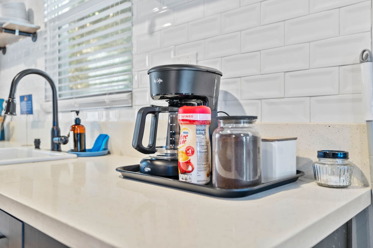 Start your day right with a steaming cup of coffee! Our kitchen is equipped with a convenient coffee maker, making it easy to enjoy your favorite brew in the comfort of your home away from home.