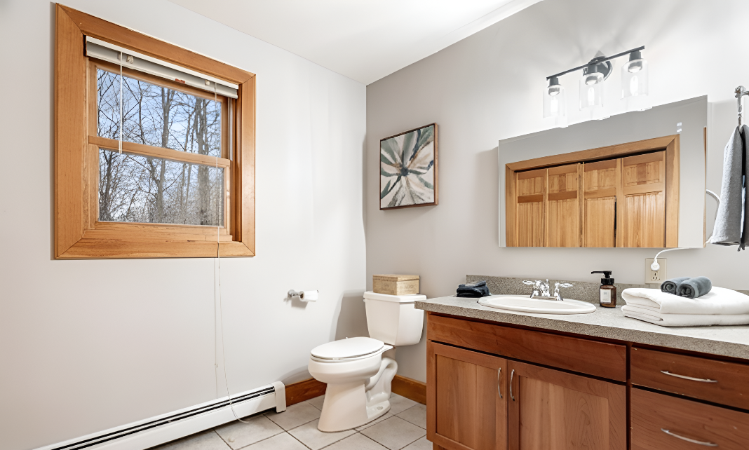 Enjoy a spacious bathroom with a walk in shower that makes mornings smooth even with a full house.