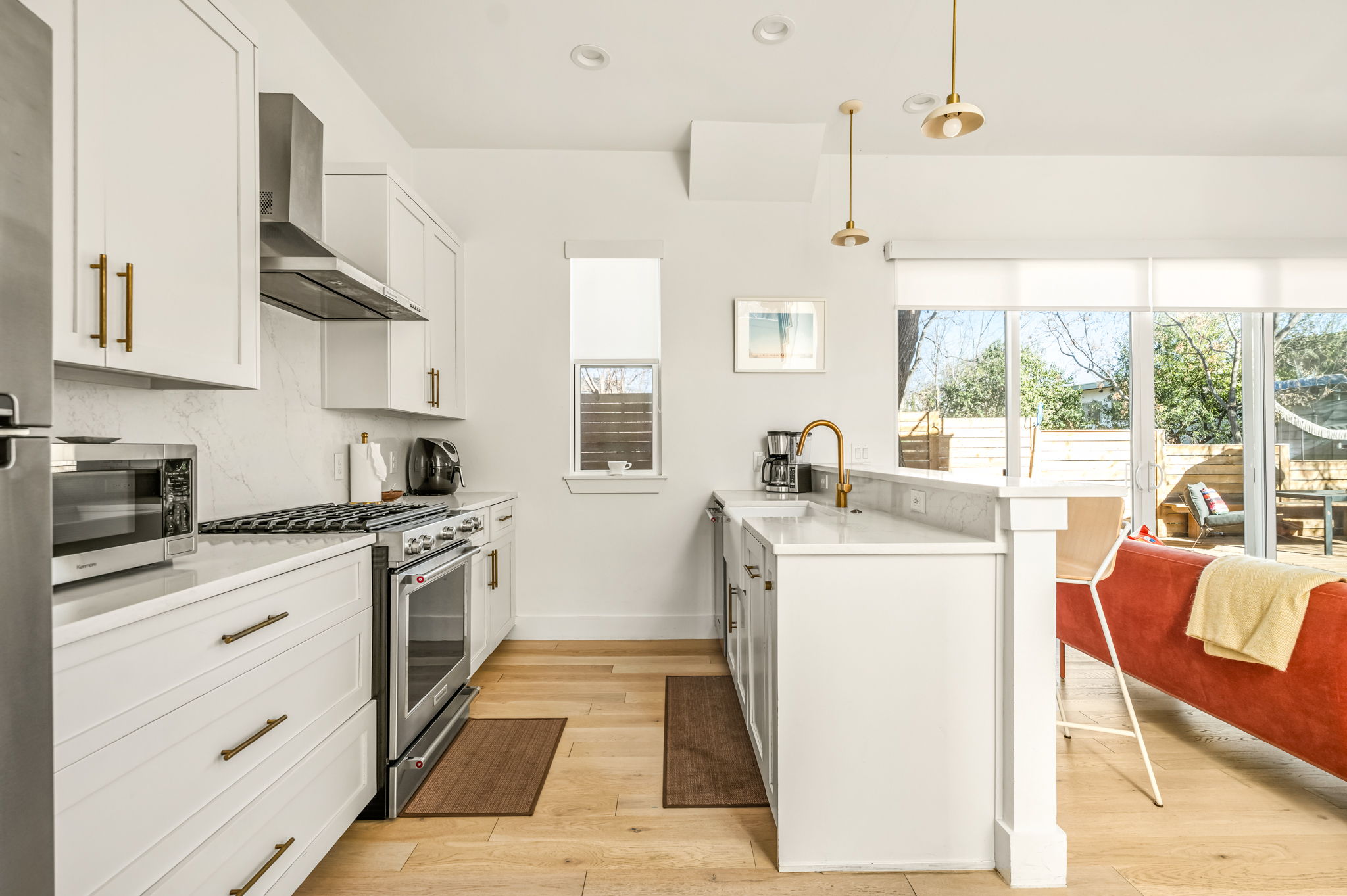 Sleek kitchen featuring a gas range and modern cabinetry