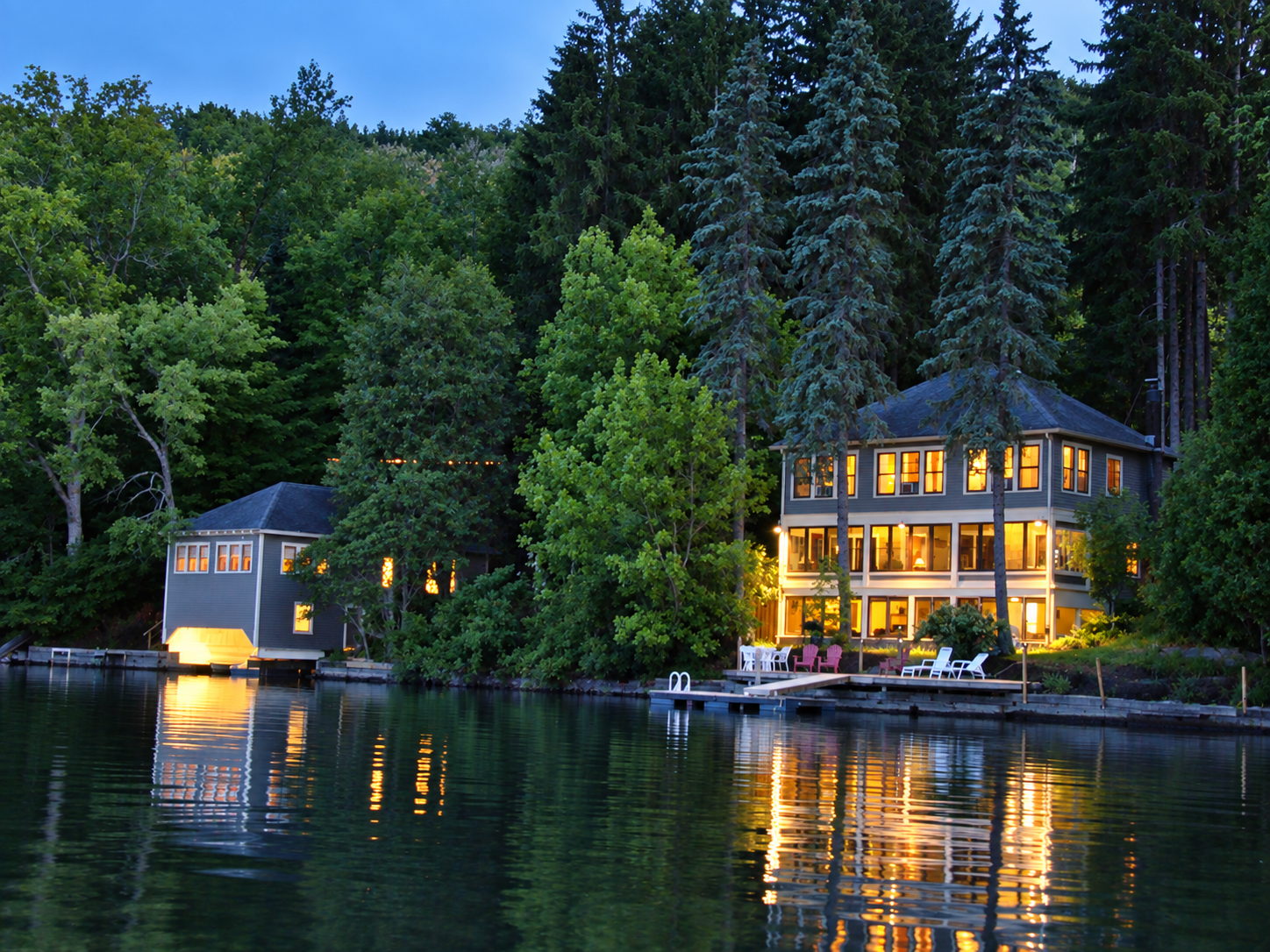Goodyear Lodge Boathouse on left + Goodyear Lodge on right at night.