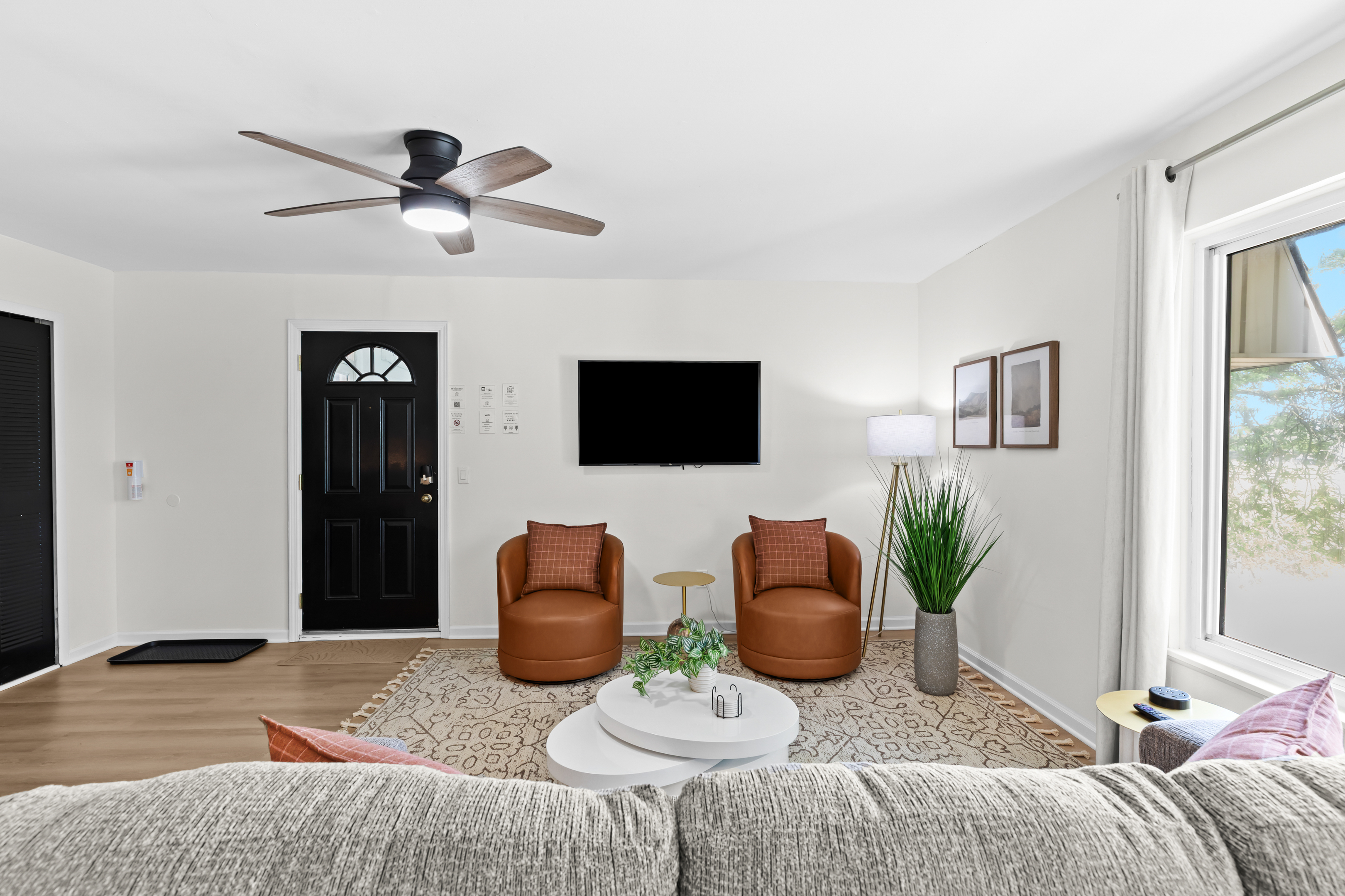 Warm welcome with a comfortable seating nook and tasteful décor.