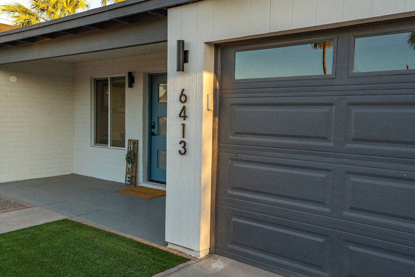 Modern exterior details—from clean lines to sleek house numbers—set the tone for your stay.