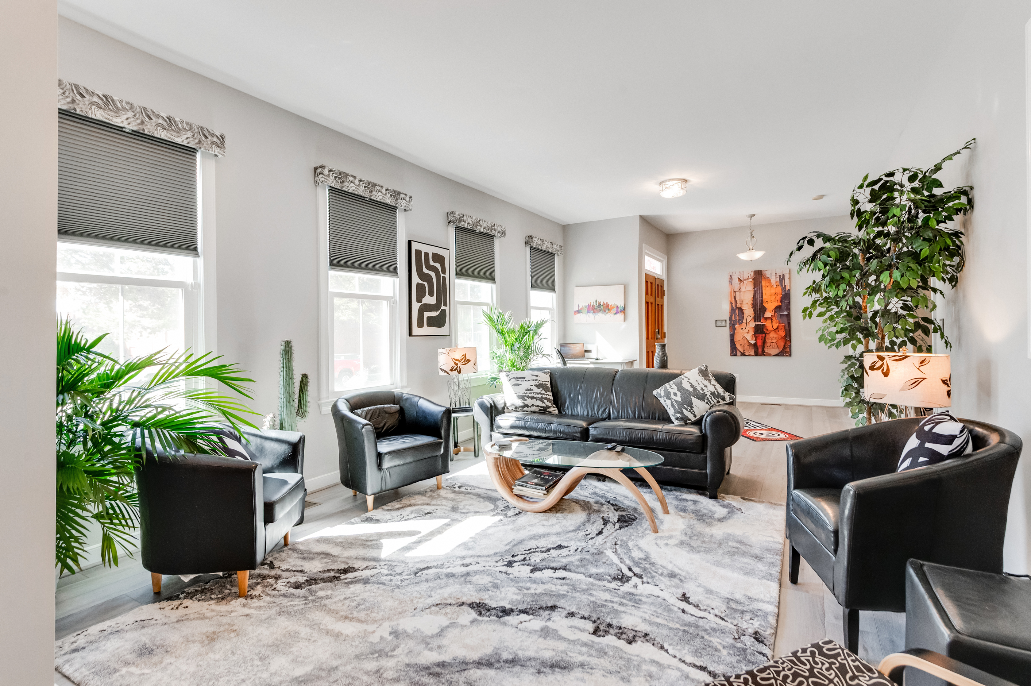 Living Room Oasis: Bright and airy space with stylish decor, perfect for relaxation and conversation!