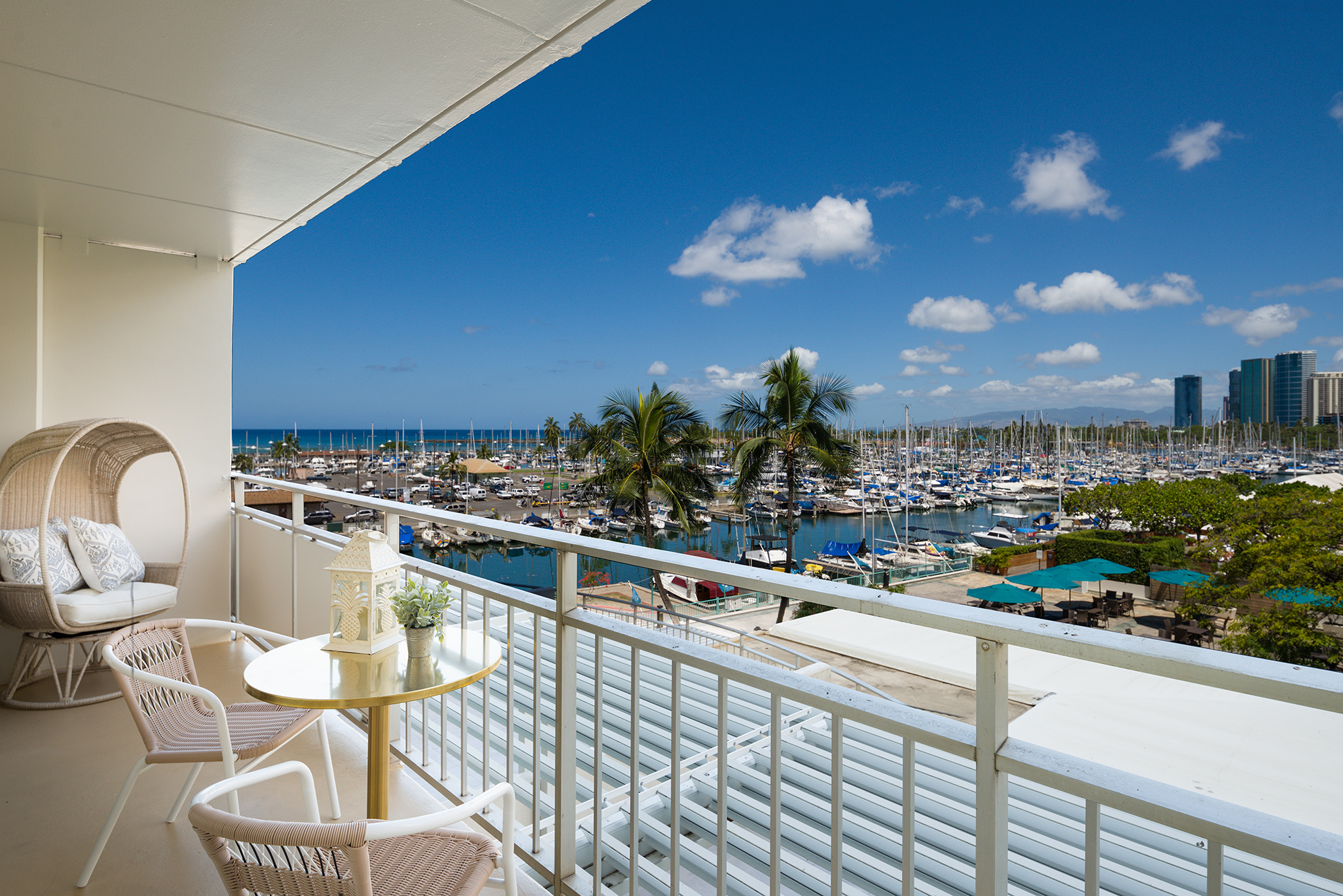Waikiki yacht harbor, ocean and gorgeous sunset views right from your private balcony!  