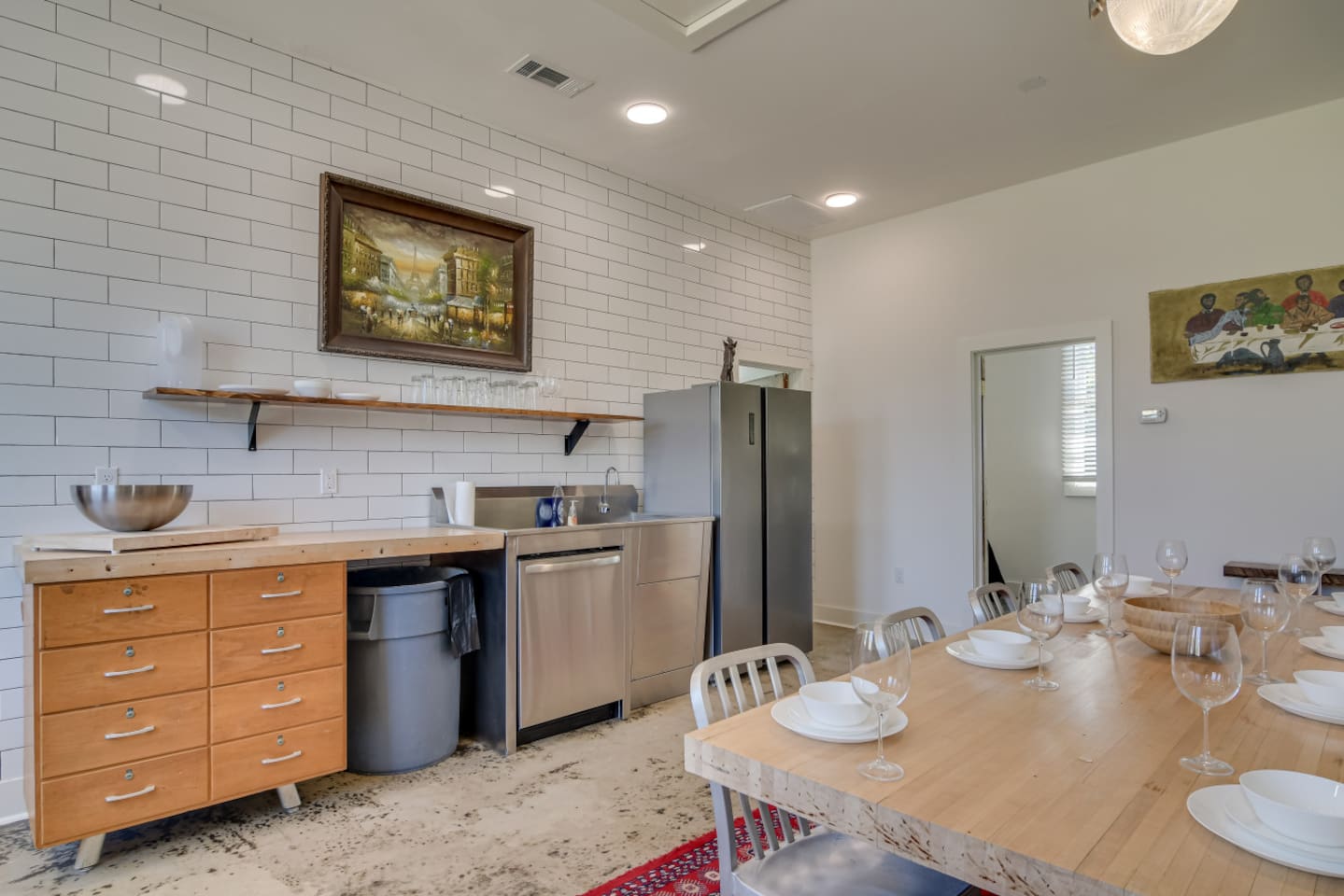 Living area with open flow into the kitchen and dining.