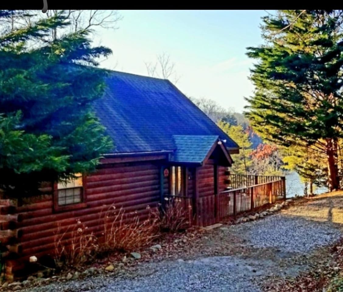 3 story log cabin overlooking Mirror Lake in Lake Lure