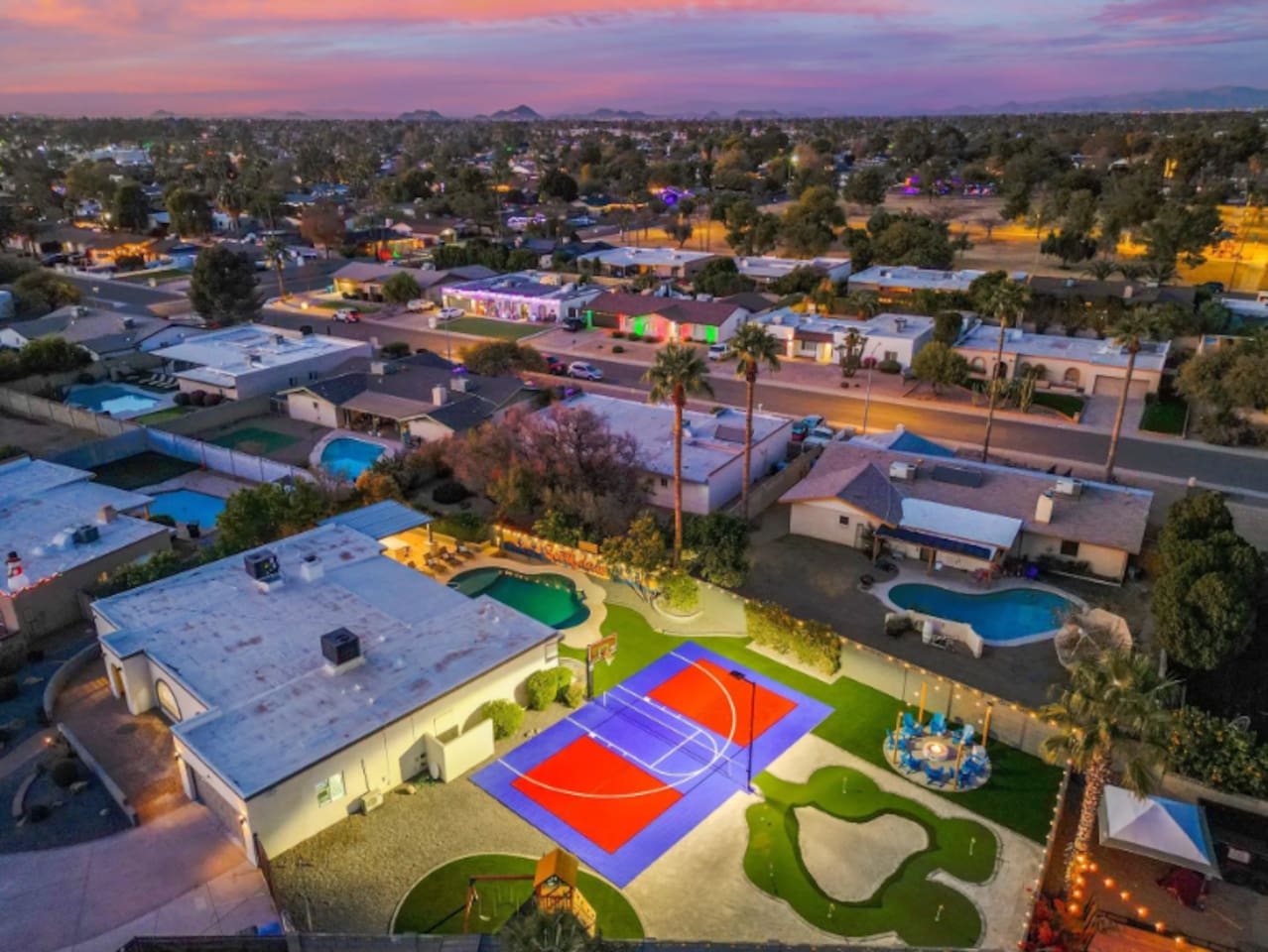 Putting green, sport court, and pool in one frame — there's a reason groups keep coming back to this one.