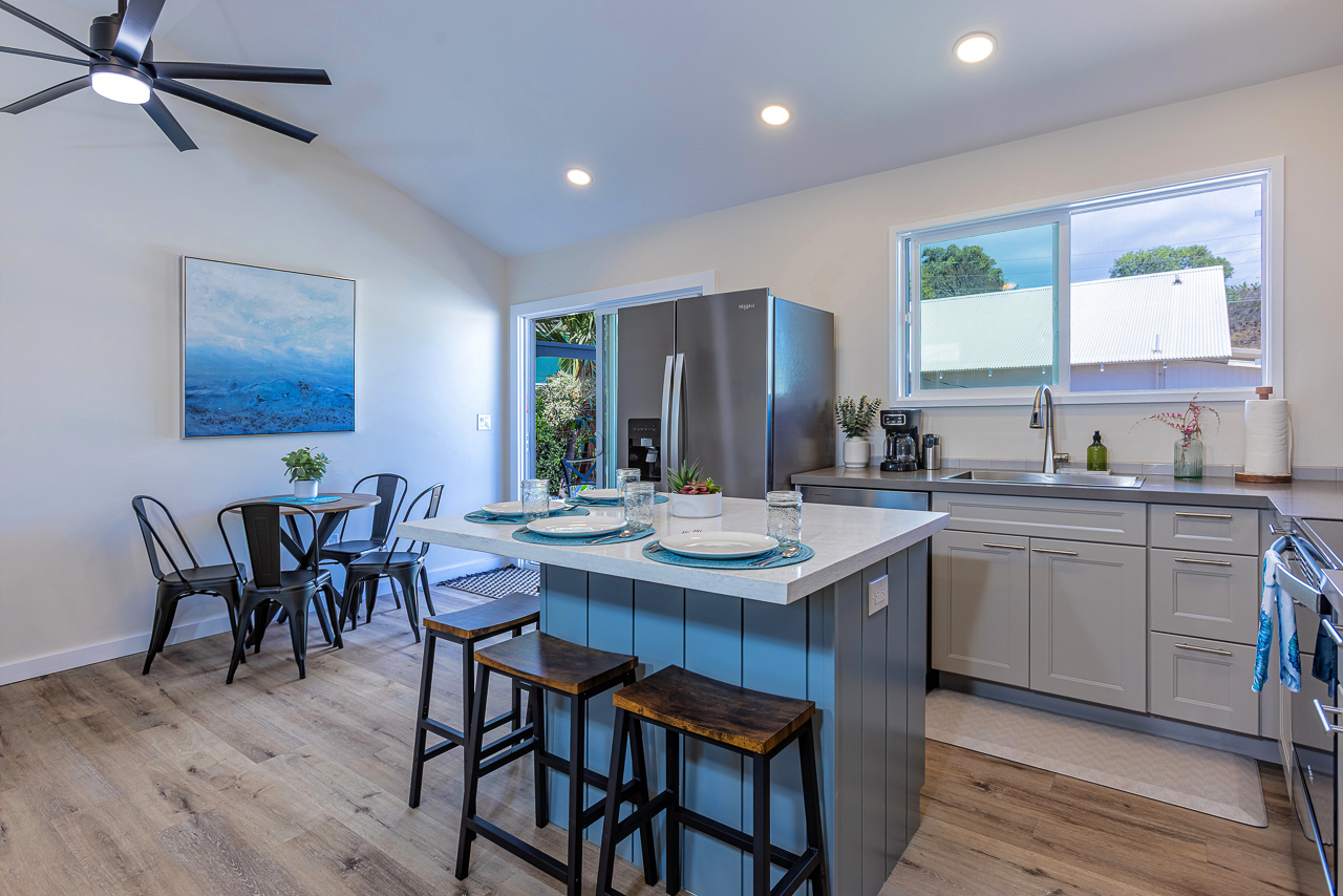 Seat Up to 8 Inside Via the Table and Barstools