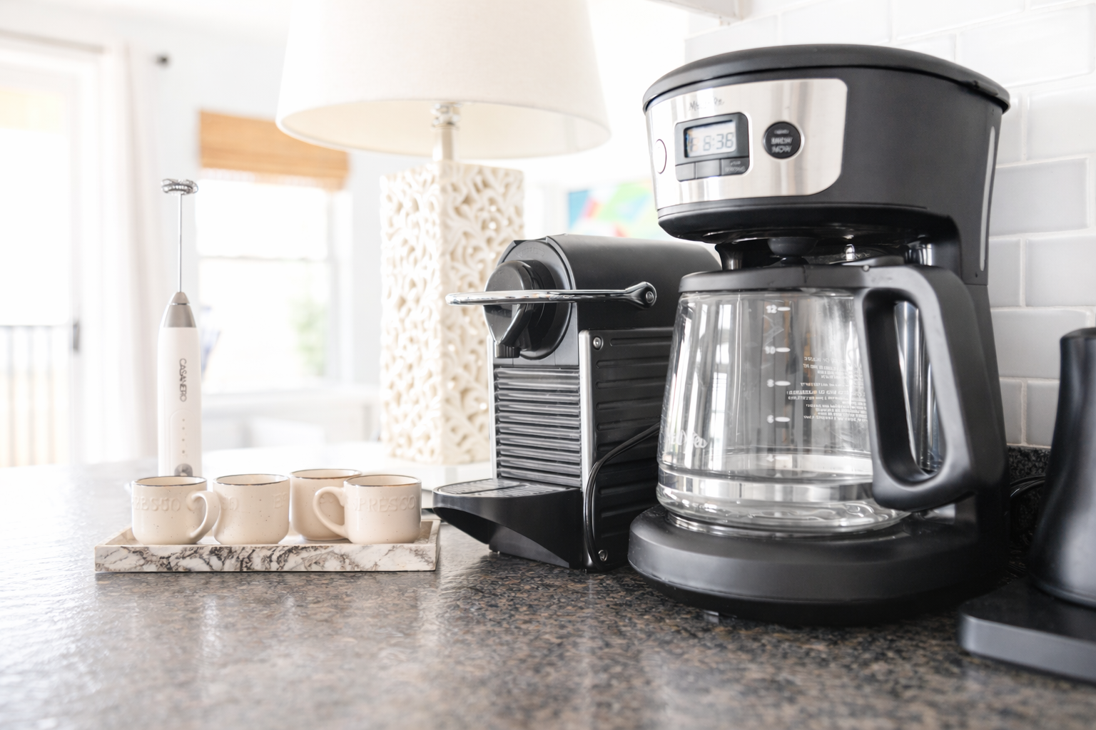Morning starts easily here, with a well-equipped coffee station ready for slow starts before heading out to the beach