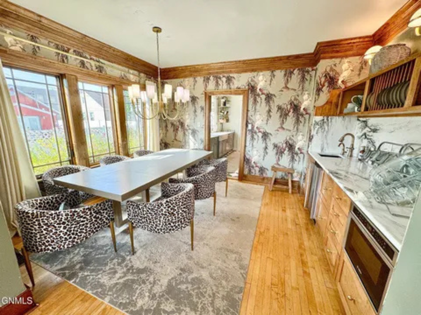 A roomy kitchen with dining space, bar seating, and a comfortable flow for group stays.