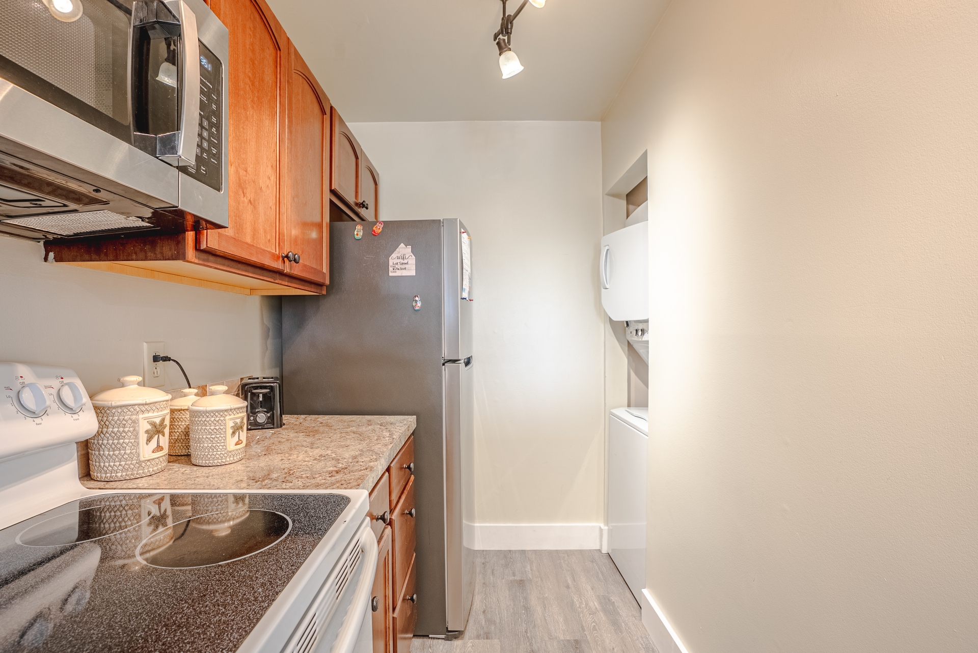 Full kitchen well equipped with appliances large and small