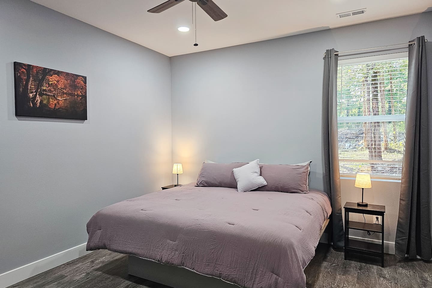Cozy private King suite with soft modern touches.