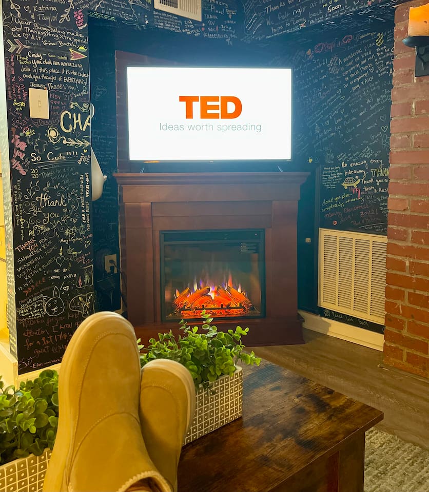 Kick back and relax in our cozy den complete with a 40” smart tv with roku streaming and a remote control electric fireplace.