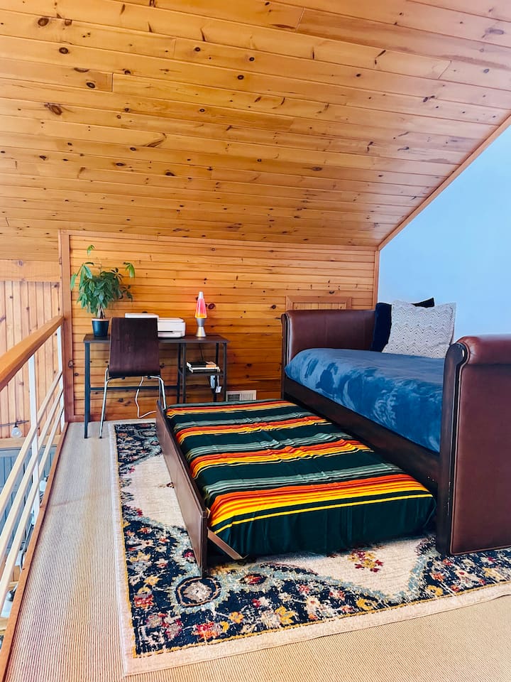 Fun bunk sleeping area perfect for kids or larger groups.