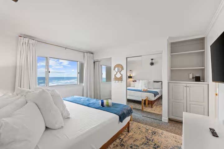 King bed with Twin foldable bed in closet.  Elfa Storage for clothing.  Ocean views and sounds