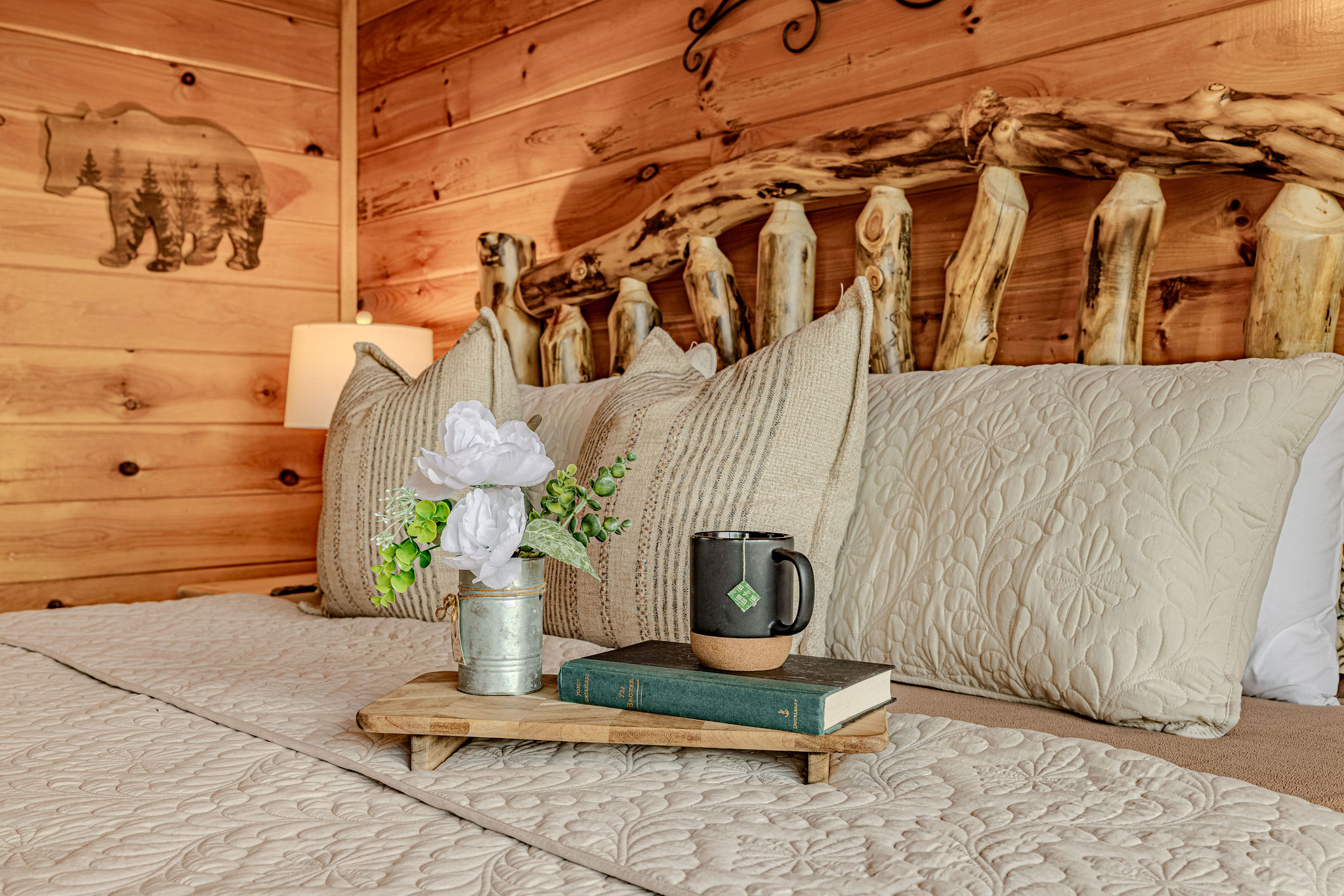 Your comfortable escape! The cozy second suite bed, ready for reading or relaxation. Convenient USB charging stations on both nightstands.